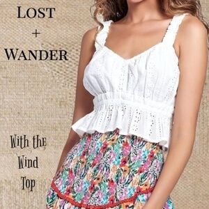 LOST + WANDER With The Wind Sleeveless Sweetheart Neck Peplum Hem Eyelet Top